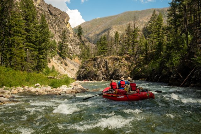 ROW Adventures oar boat navigating down a splashy rapid on the Middle Fork of the Salmon.